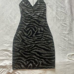 Mini dress , perfect night out dress .